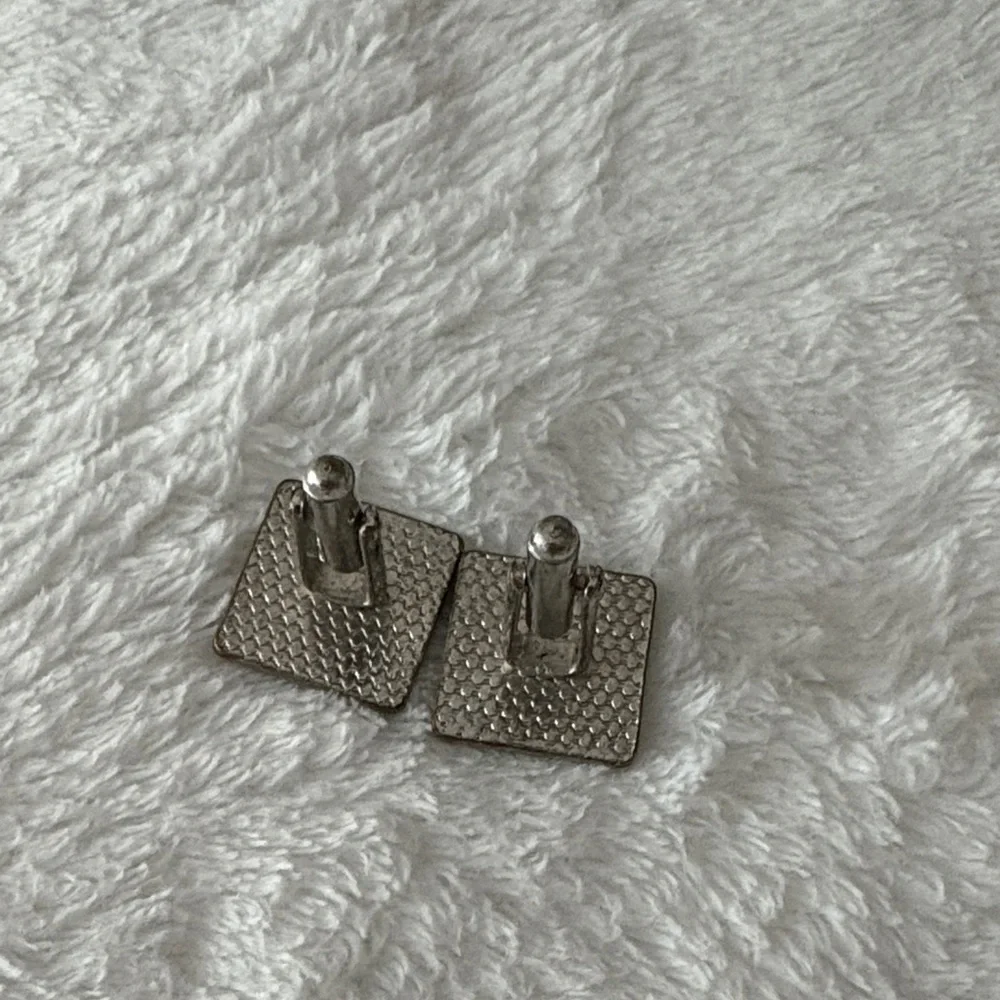 Elegant Silver and Black Cufflinks